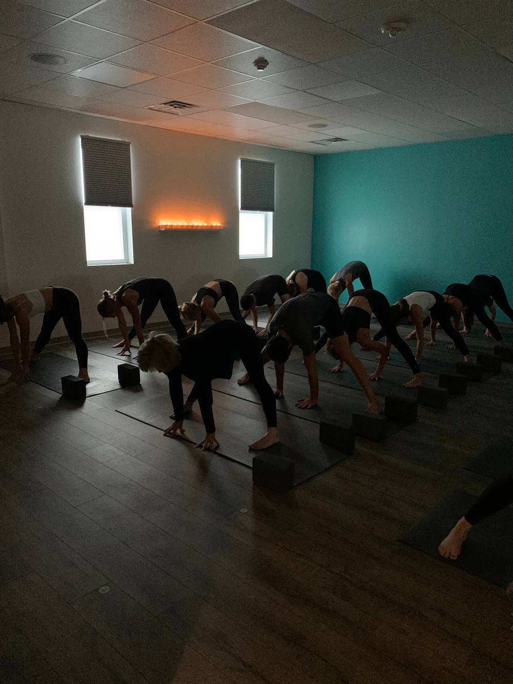 hot yoga class in session at ride + reflect