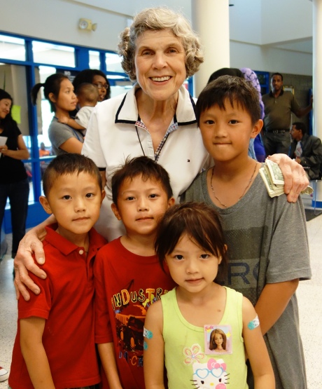 Mary Jo Copeland with a group of children