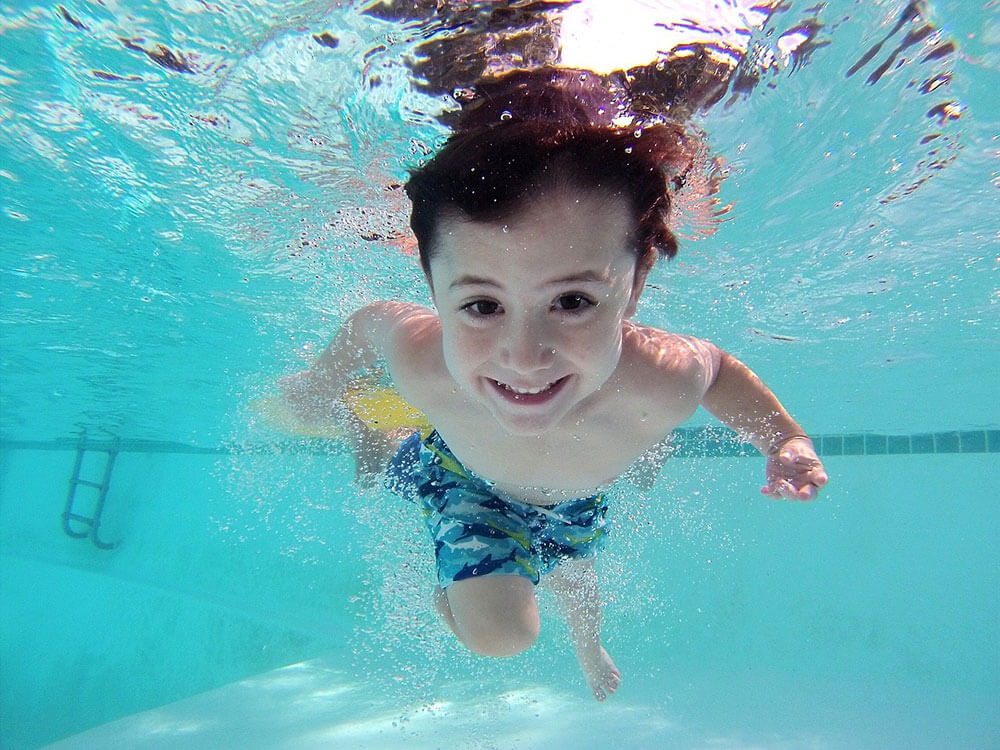 little boy underwater