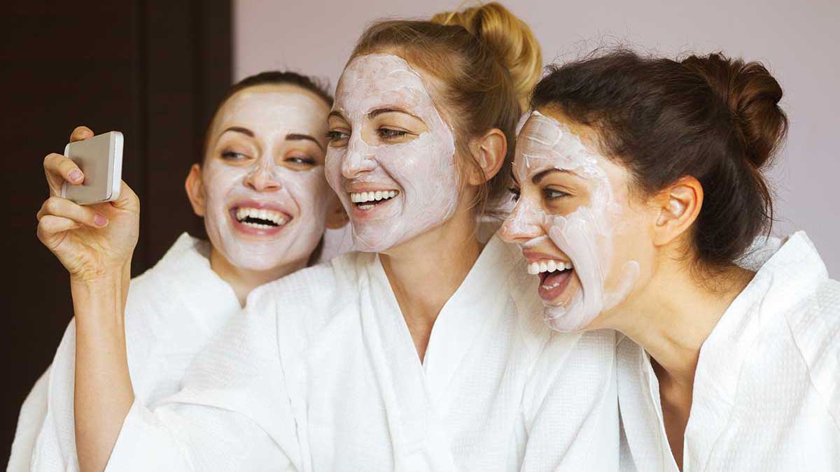 women getting facials at a spa party