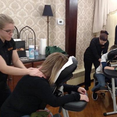 woman receiving a massage at a spavia franchise