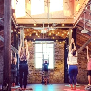 yoga at naked river brewing with spenga chattanooga