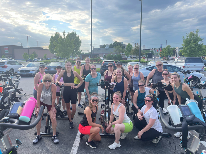 SPENGA Marlborough Members outside in a parking lot on bikes