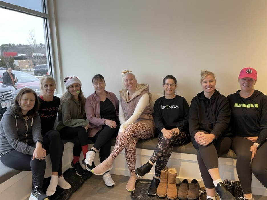 Group of SPENGA Members sitting on a bench