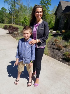 julie with her son, october member of the month at spenga roswell