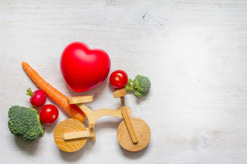 wooden bike and vegetables