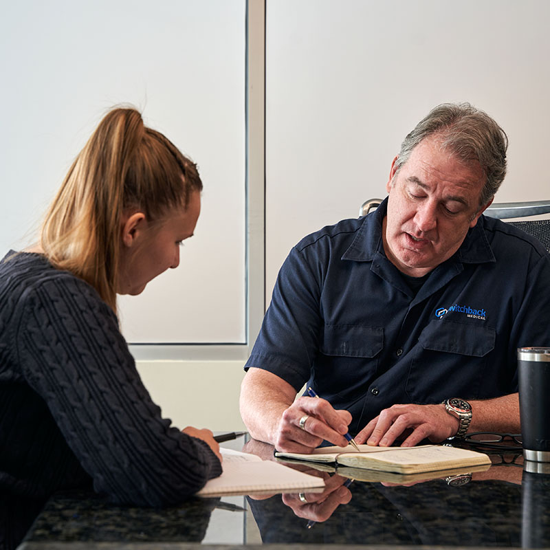 two switchback medical team members discussing medical device development