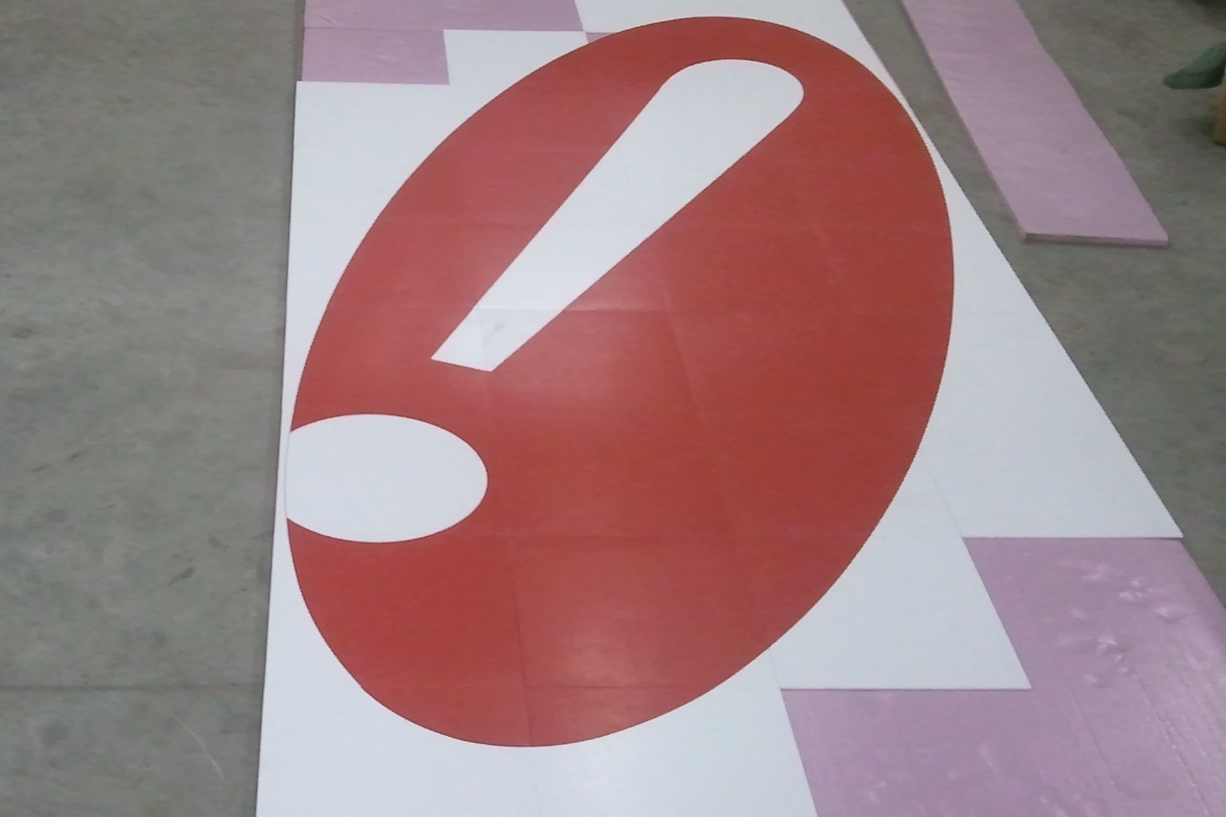 Logo cut out of VCT tile 2