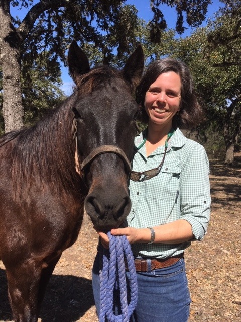 the owner of Mariposa Heartworks with a horse