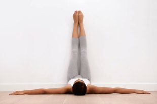 woman wall workout at Yoga Bumps & Babies