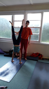 Handstand with support